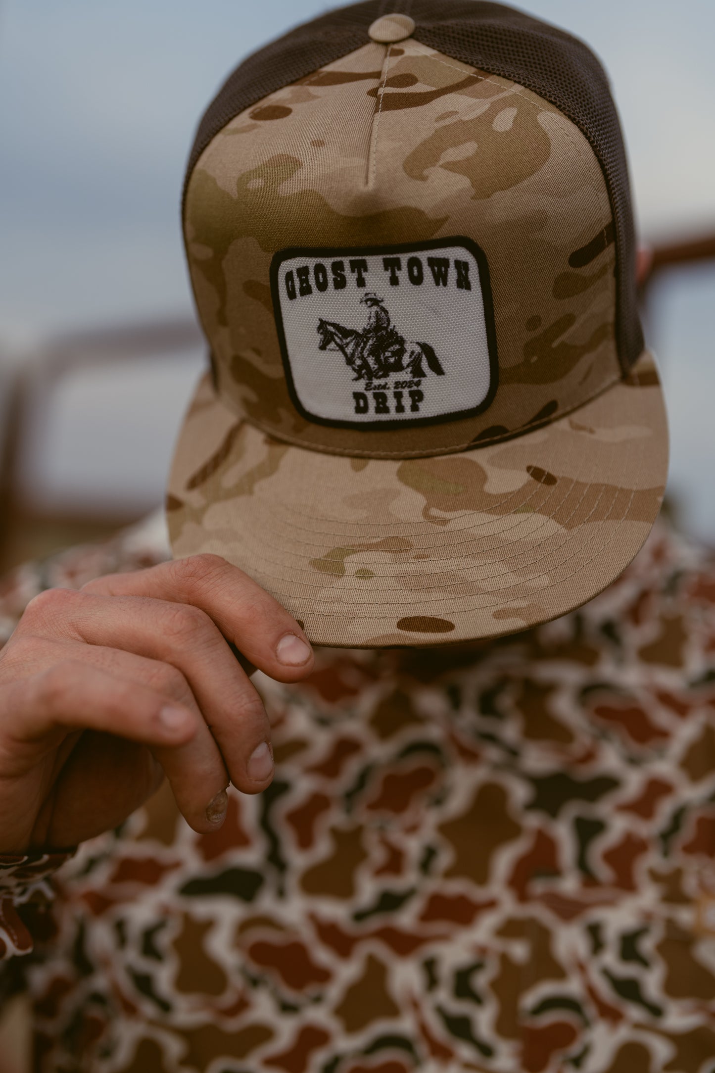 GHOST TOWN DRIP WESTERN CAMO TRUCKER HAT