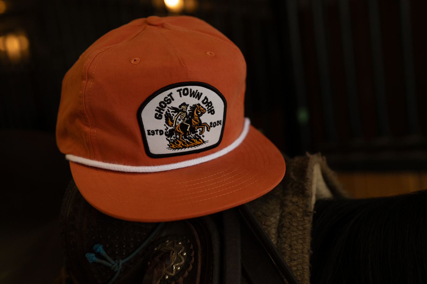 Orange Embroidered Ghost Town Cowboy logo hat