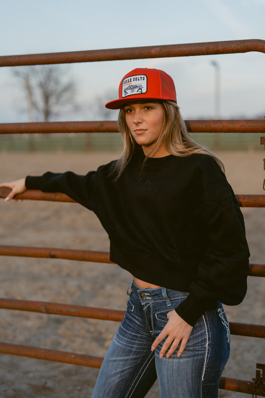 girl wearing cropped black western warmup hoodie Ranch Dress'n