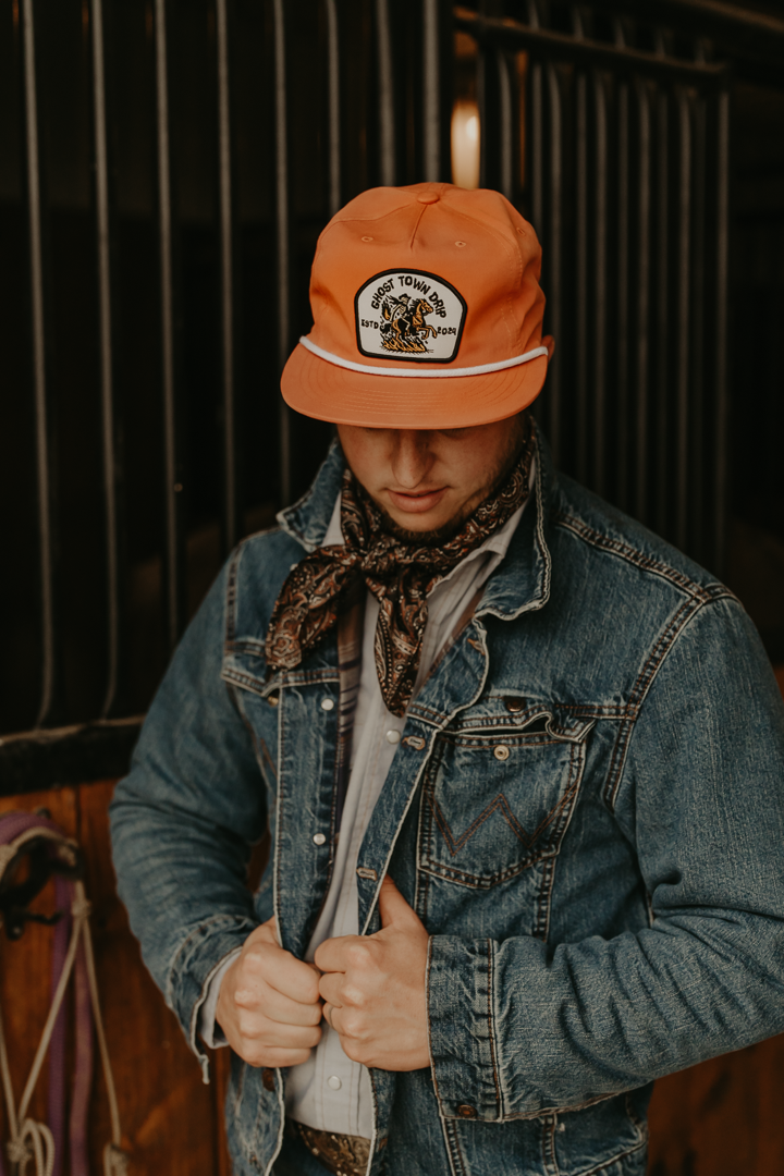 Orange Embroidered Ghost Town Cowboy logo hat